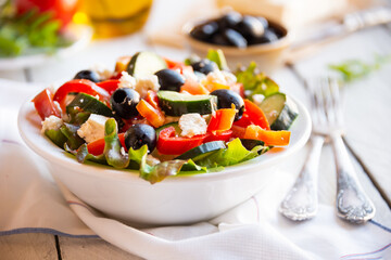 Greek salad with vegetables and feta cheese, healthy vegetable meal