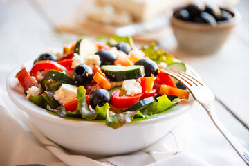 Greek salad with vegetables and feta cheese, healthy vegetable meal