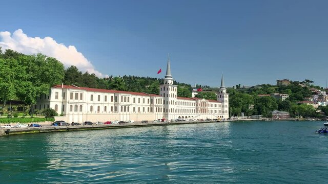 Footage of historical military school called "Kuleli Askeri Lisesi" in a neighborhood called "Cengelkoy" in Istanbul. It is a beautiful Bosphorus scene in a sunny summer day. Camera moves forward.