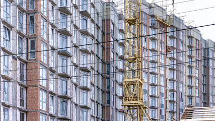 unfinished building with concrete wall and windows frame on construction site