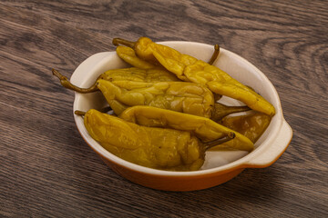 Marinated spicy and hot green pepper