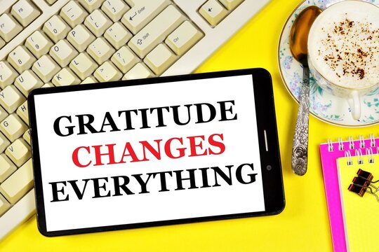 Gratitude changes everything. Text message on the smartphone screen. Expression of politeness, satisfaction, positive assessment of events.