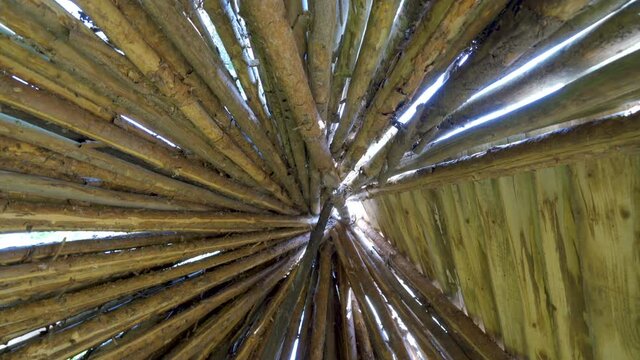 The top of the teepee hut with the cooking pot inside made in the bamboo woods