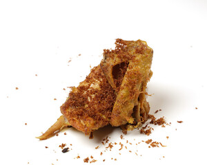 Indonesian spices fried chicken, isolated white background. a portrait of fried chicken thigh and chicken breast.