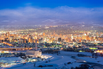 Obraz premium Asahikawa, Japan twilight winter cityscape in Hokkaido
