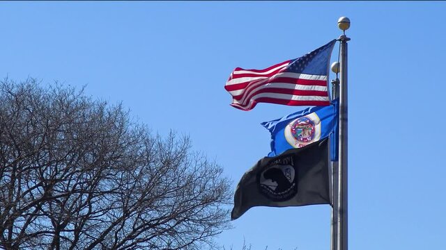 USA flag and Flag of american state of Minnesota waving in wind, Reast Area