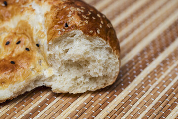 National flatbread with tandoor sesame seeds. Traditional homemade bread.