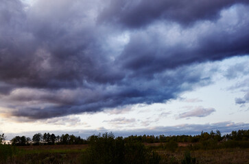 Dramatic black cloud before rainy.  Beautiful cloudscape over horizon, sky