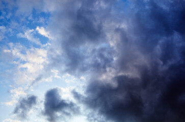 Dramatic black cloud before rainy.  Beautiful cloudscape over horizon, sky