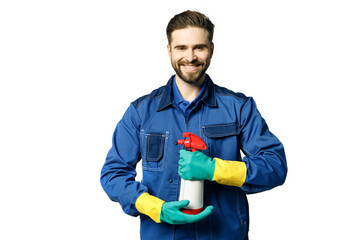 Young handsome man with a beard in a blue working uniform for cleaning rooms in rubber gloves and a janitor's uniform holds chemical spray bottle for cleaning. Isolated on a white background