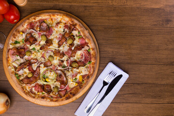 Tasty Portuguese Pizza made with ham, pea egg, heart of palm, pepperoni, onion and mozzarella and...
