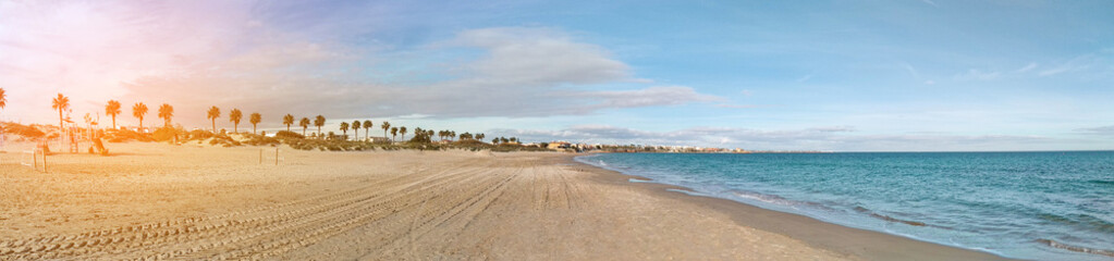 Panorama. Beach and sea in Torre de la Horadada, Spain. Beautiful sunset.