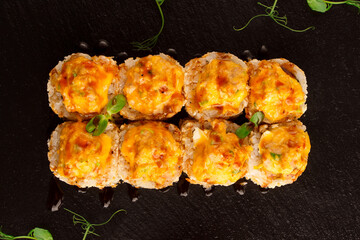 Japanese food: Set of salmon sushi and rolls with salmon and eel