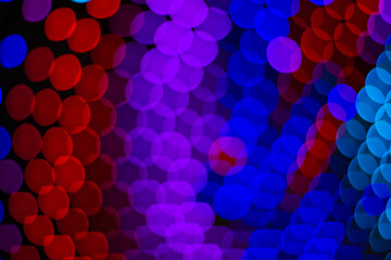 festive purple blue red colorful bokeh from lamps light unfocused holidays concept