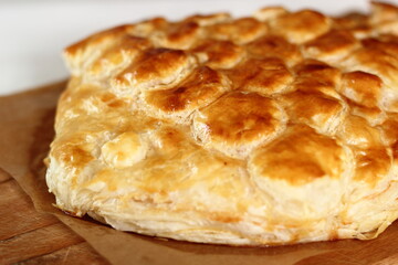 Freshly baked pie. Making Salmon in Puff Pastry Series.