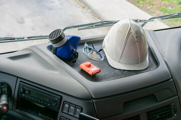 Personal protective equipment in the cabin of a truck that transports dangerous goods, consisting...