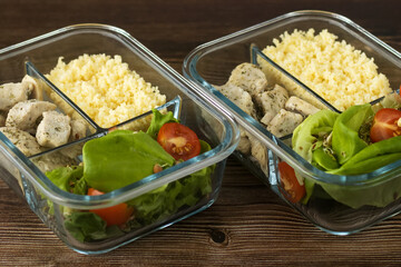 healthy food-couscous, salad and Turkey in glass boxes