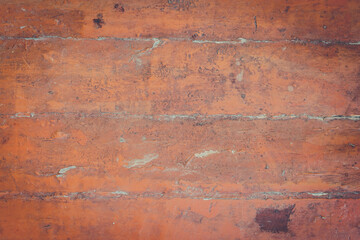 Old boards covered with paint close-up. Old floor background texture
