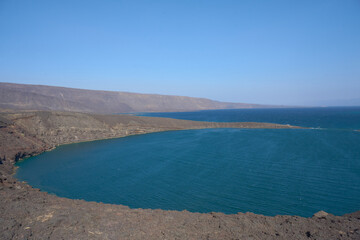 Baie des Requins (Bay of Sharks), Djibouti.
Is a deep lake inside the  the Bay of Ghoubet, Djibouti It is a crater formed due to a phreatic eruption. It is a well known diving site.