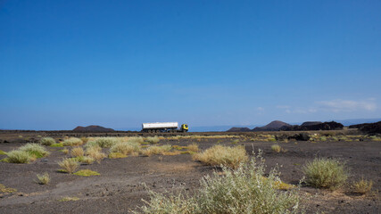 Highway passing through the Lava fields of Djibouti, East Africa
A passing tanker carrying fuel supplies to Ethiopia