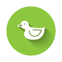 White Rubber duck icon isolated with long shadow. Green circle button. Vector.