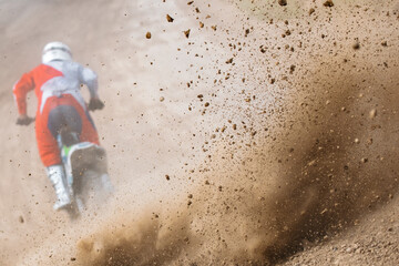 Rider and Huge Cloud of Dust on Motocross Competition. Dynamic Photo of Extreme Sports in Motion