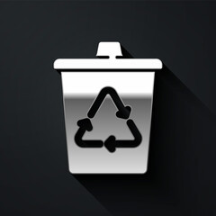 Silver Recycle bin with recycle symbol icon isolated on black background. Trash can icon. Garbage bin sign. Recycle basket sign. Long shadow style. Vector.