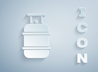 Paper cut Propane gas tank icon isolated on grey background. Flammable gas tank icon. Paper art style. Vector.