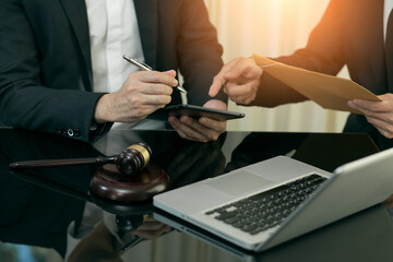 Judge gavel with Justice lawyers having team Concepts of Law and Legal services