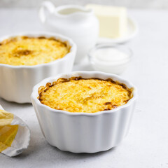 Millet rice bake in baking dishes. Space for text.