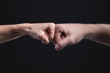 A punch or force of five is a gesture of respect or approval. A greeting with the banging of fists