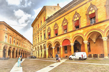Fototapeta na wymiar Street in old town colorful painting, Bologna, Emilia-Romagna, Italy.