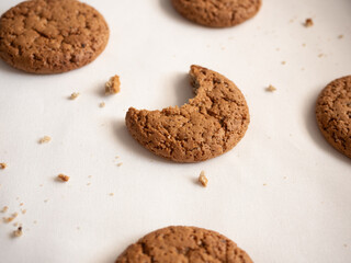 Oatmeal cookies on white plate in morning light