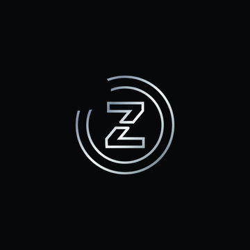 Elegant Design of Z Alphabet . Silver Enclosure Logo Design For Letter Z. Uppercase Letter Z is Enclosed in Two Circle. Modern and Unique Logo Design For Letter Z.