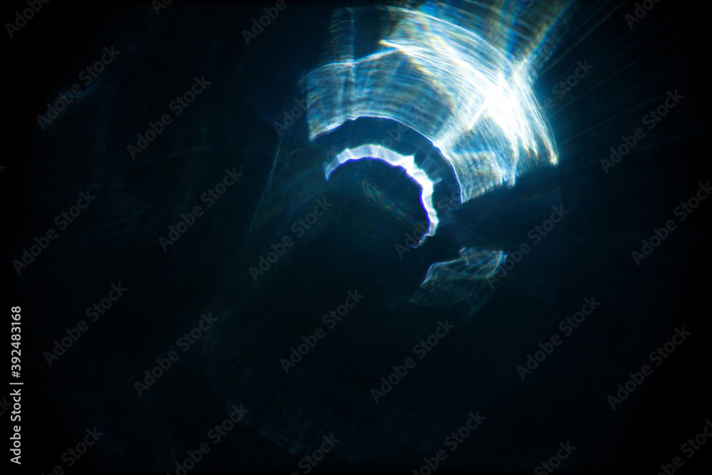 Aufkleber Easy to add lens flare effects for overlay designs or screen blending mode to make high-quality images. Abstract sun burst, digital flare, iridescent glare over black background.