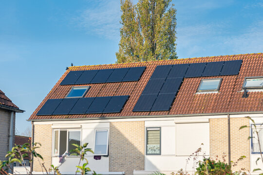 Photovoltaic Solar Panels On The Roof Of A House