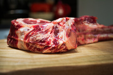 Raw Dry Aged Barbecue Tomahawk Steak ready for grill