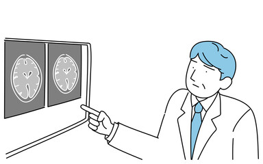 脳のMRI検査で撮った画像を指さす男性医師