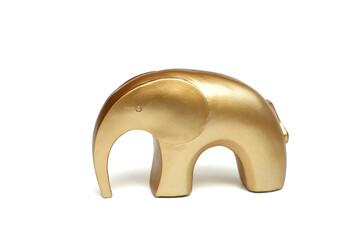 Elephant of gold color on a white background. Isolate