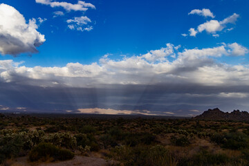 Wide Landscape Image Of Sunbeams Over Arizona Desert