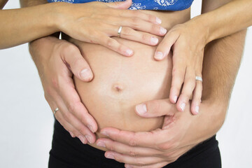 person with hands on belly