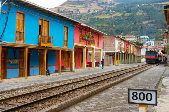 Ecuador, in the village of Alausi. Typical houses as well as the famous old wooden train on the railway station
