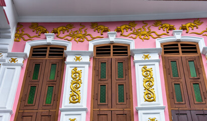 colorfully decorated doors and house walls in Phuket