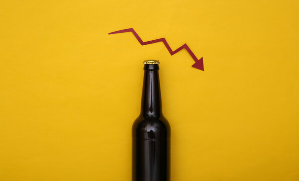 Drop arrow and beer bottle on yellow background