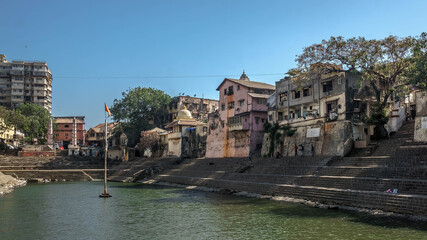 Fototapeta na wymiar Banganga Tank is an ancient water reservoir that is part of the Valkeshwar temple complex at Malabar Hill in Mumbai in India