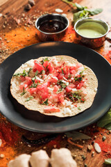 Assortment of various kinds of Indian cousine Indian Food on Wooden rusty table