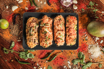 Assortment of various kinds of Indian cousine Indian Food on Wooden rusty table