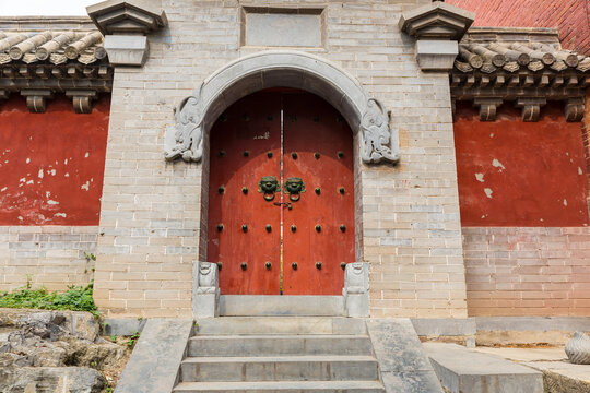 Dengfeng, China - October 17, 2018: An old style stone door inside Shaolin Temple songshan dengfeng city henan province China.