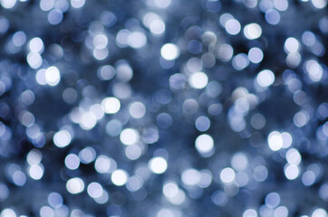 Festive background with light spots and bokeh.