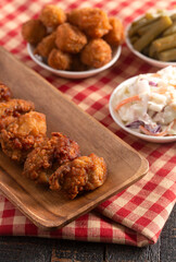 Breaded and Fried Oysters on a Wooden Table